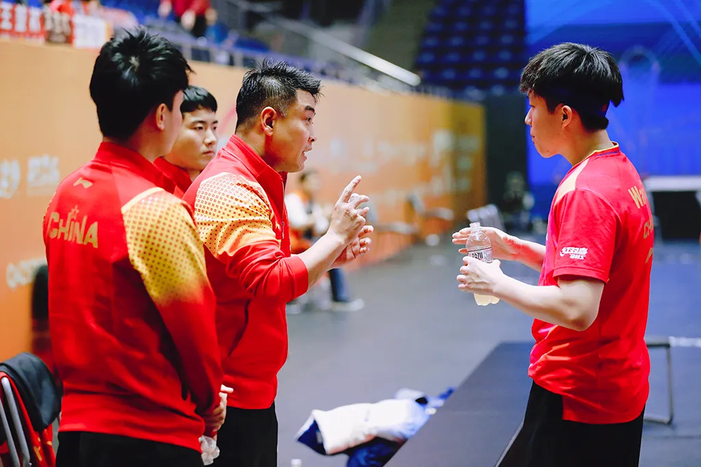 Wang Chuqin and Coach Wang Hao during time break at 2024 Asian Table Tennis Championships at Astana.