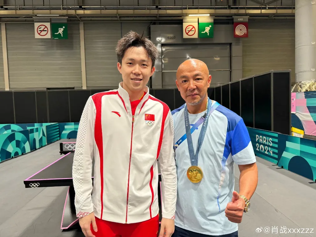 Wang Chuqin and Coach Xiao Zhan celebrated for the mixed doubles gold at Paris Olympics