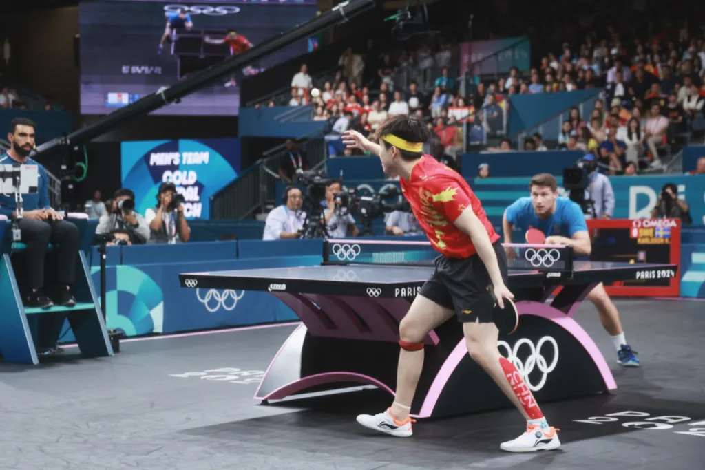 Carrying months of mysterious shoulder pain and body exhaustion, with Kinesio tape across his body and legs and an ankle sprain just a day earlier, Wang Chuqin still helped China defend the team title in both doubles and singles at Paris Olympics, 2024.